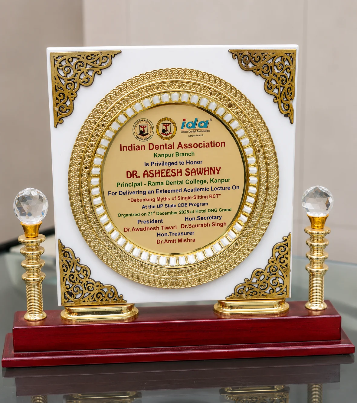 Indian Dental Association Kanpur Branch honor plaque presented to Dr. Asheesh Sawhny