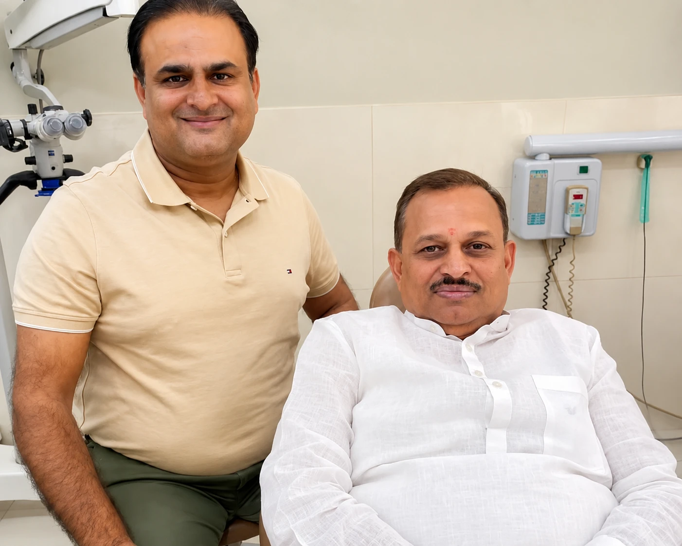 MP Ramesh Awasthi with Dr. Asheesh Sawhny at My Dentist Kanpur — Zeiss microscope treatment room