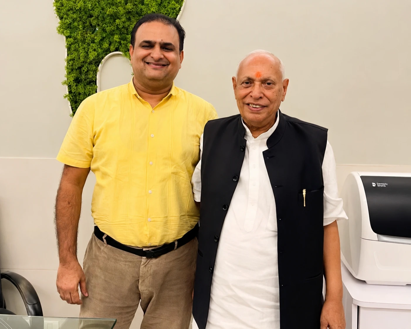 Renowned astrologer Padmesh Dubey with Dr. Asheesh Sawhny at My Dentist Kakadeo Kanpur