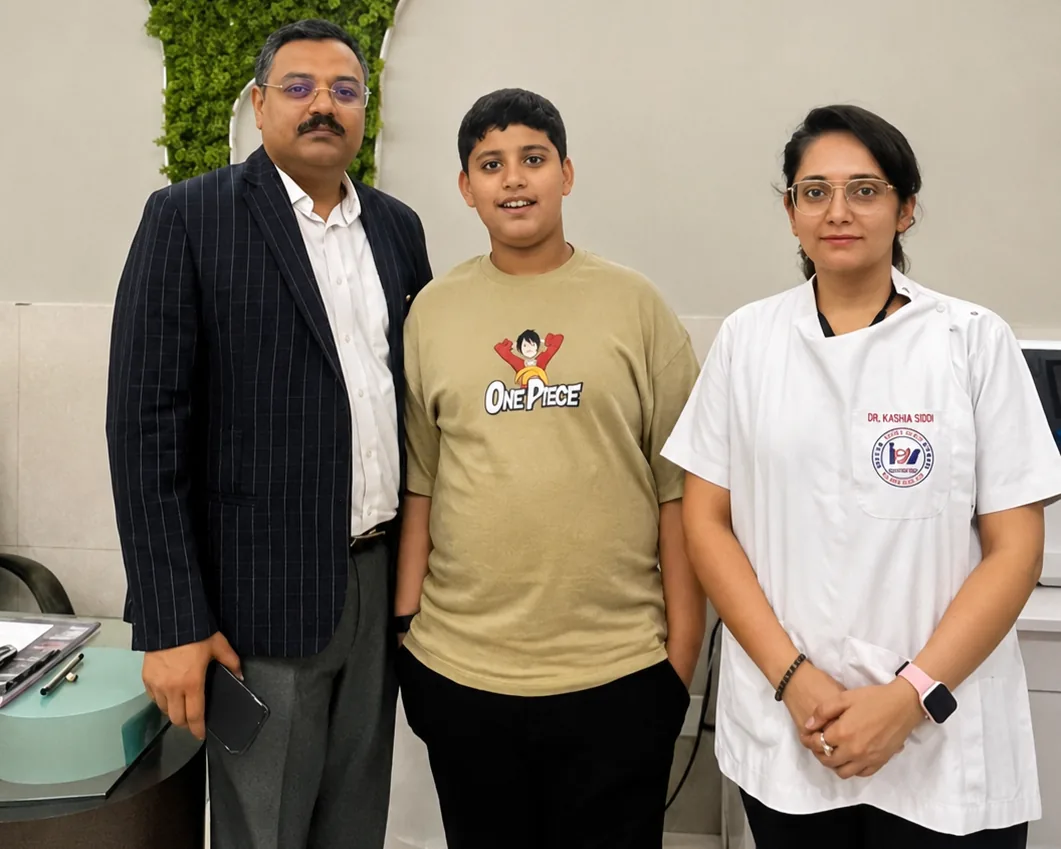 Dr. Asheesh K. Sawhny with a young patient and Dr. Kashia Siddiqui at Dr Sawhney’s My Dentist Kanpur