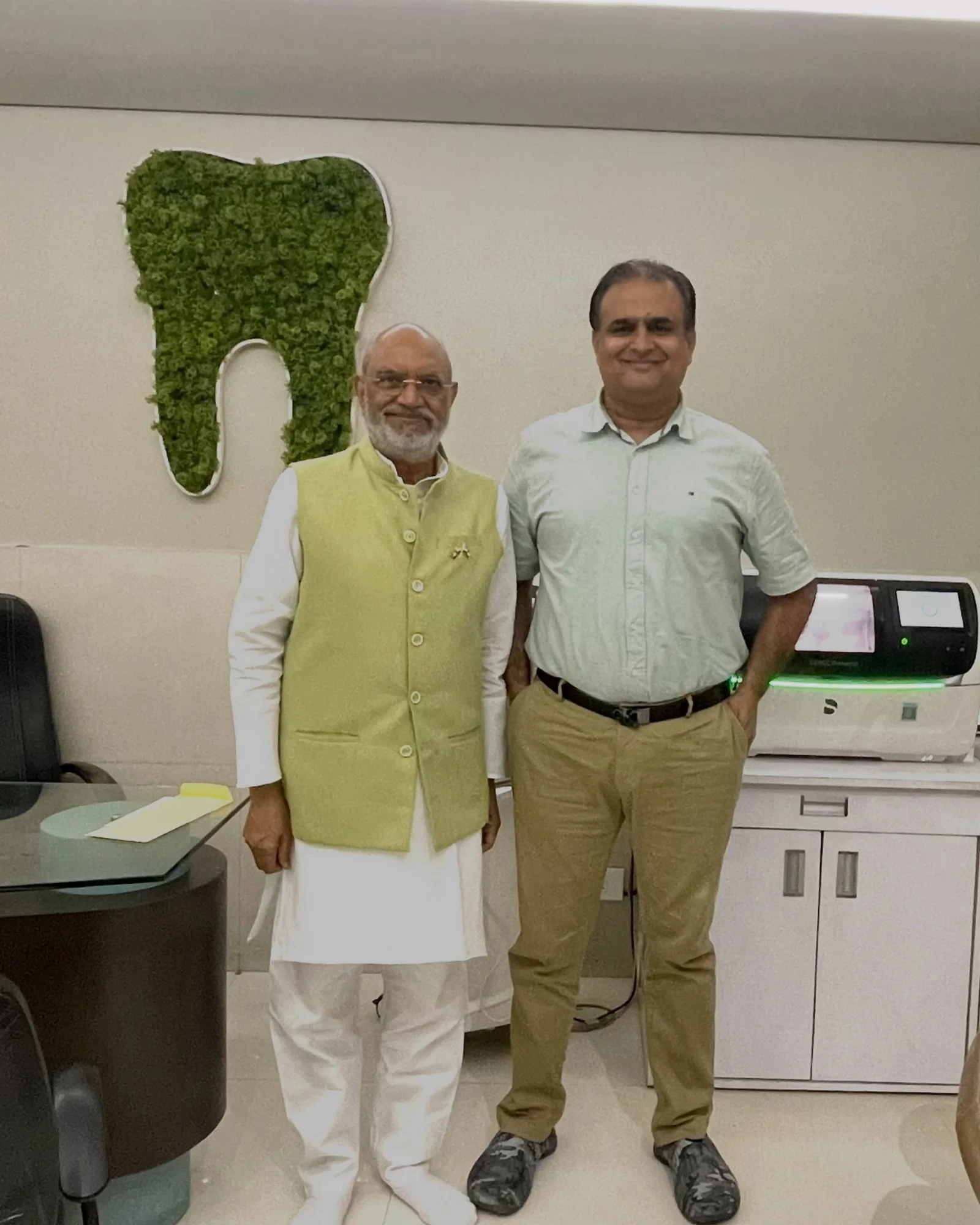 Dr. Asheesh K. Sawhny with a visiting guest at Dr Sawhney’s My Dentist, Kakadeo, Kanpur