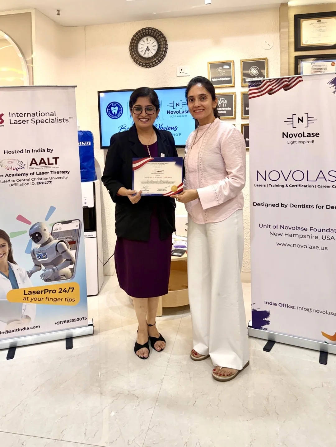 Dr. Karuna Singh Sawhny receiving a Certificate of Standard Proficiency at a laser dentistry workshop hosted by AALT