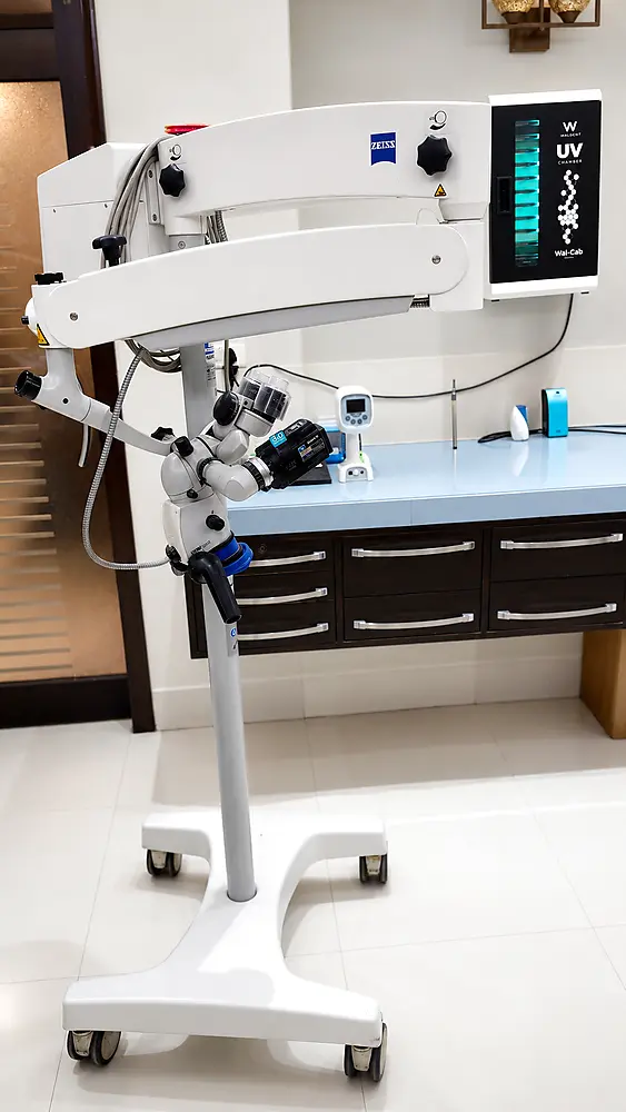 Carl Zeiss dental operating microscope — complete mobile setup on wheeled stand at My Dentist Kakadeo Kanpur