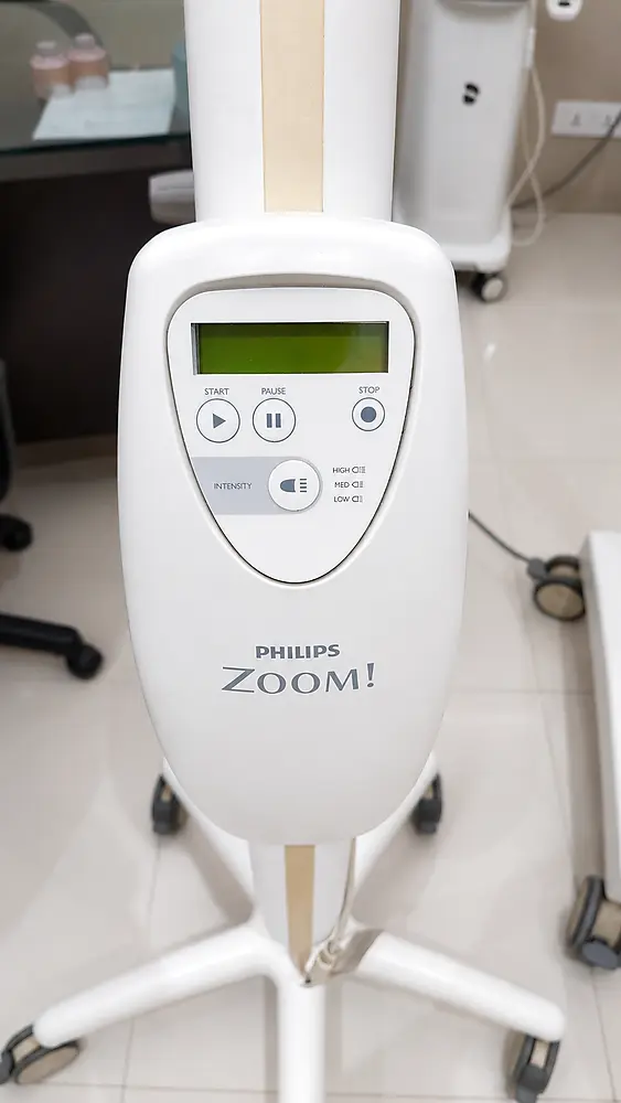 Philips Zoom whitening system control panel showing start, pause, stop and intensity settings at My Dentist Kakadeo Kanpur