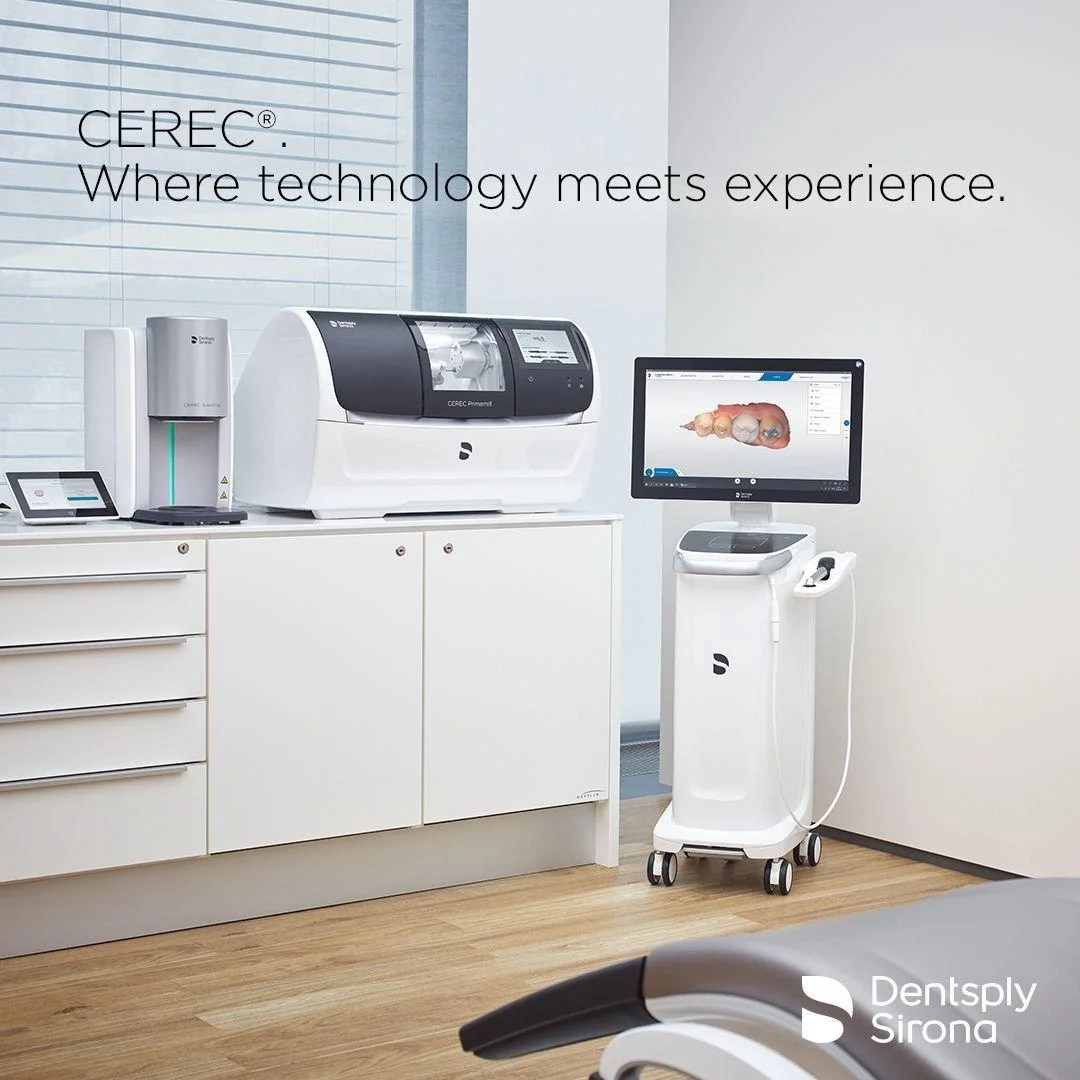 CEREC digital dentistry equipment, including the chairside milling unit and treatment chair, used for same-day crowns