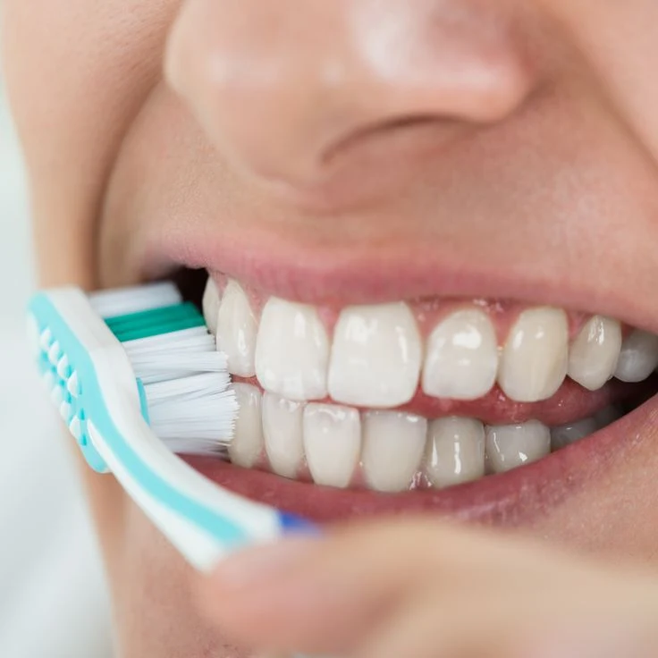 Close-up of correct tooth brushing technique — preventive dental care and oral hygiene guide by Dr Sawhney's My Dentist, Kakadeo, Kanpur